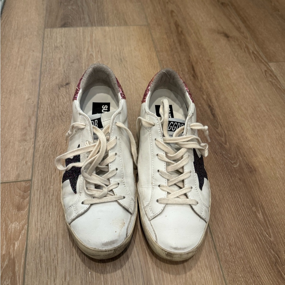 White Sneakers with Black Star Accent